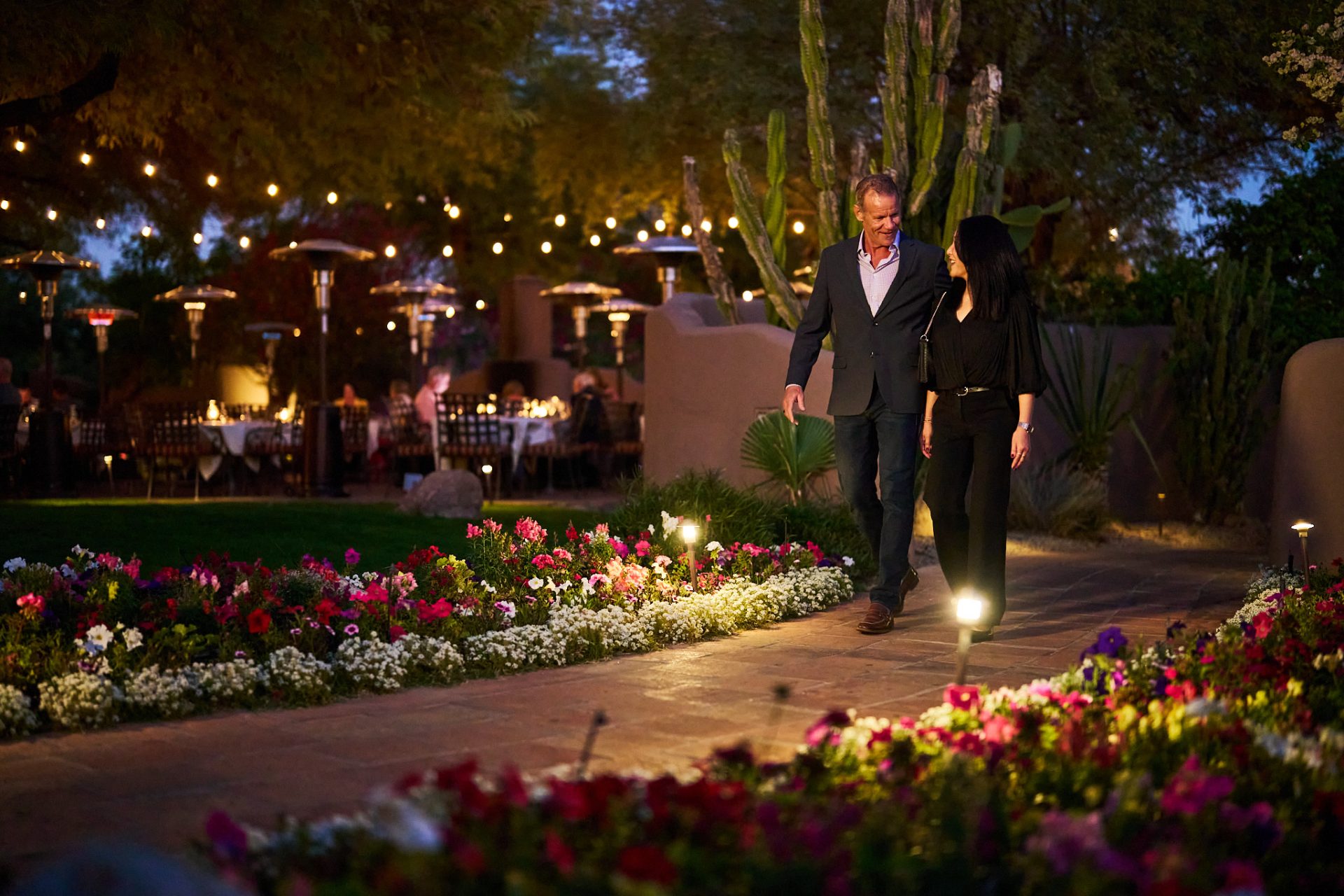 Enjoying a romantic moment walking down entryway at LON's.